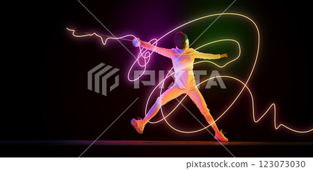 Fencer in white uniform lunging with sword extended, neon orange and green light streaks tracing movement against dark background. Fencer in white uniform lunging with sword extended, neon orange and green light streaks tracing movement against dark background. 123073030