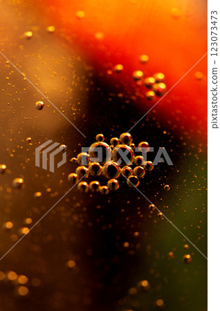 Oil in water, abstract background in golden tones Oil in water, abstract background in golden tones 123073473