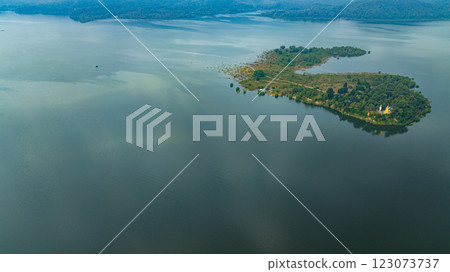 Aerial hyper lapse view of Temple on the island in the middle of the water Aerial hyper lapse view of Temple on the island in the middle of the water 123073737