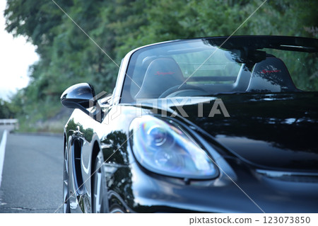 Headlights of a black convertible 123073850