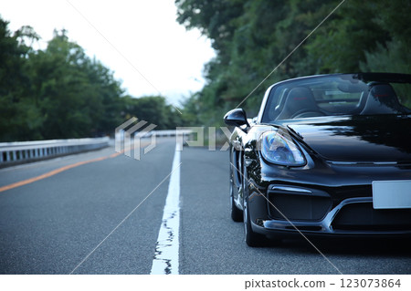 Glossy black open car Glossy black open car 123073864