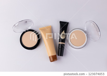 A Collection of Different Makeup Products Including BB Cream, Foundation, and Powder for a Flawless Finish and Beautiful Skin Tone 123074853