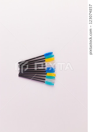 Colorful Eyebrow Brushes Laid Out Neatly on a Soft Background for Personal Care and Beauty Routine - Essential Tools for Grooming Eyebrows and Lash Maintenance Colorful Eyebrow Brushes Laid Out Neatly on a Soft Background for Personal Care and Beauty Routine - Essential Tools for Grooming Eyebrows and Lash Maintenance 123074857