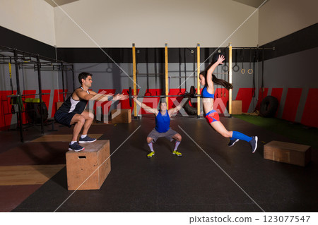 gym group workout barbells slam balls and jump 123077547