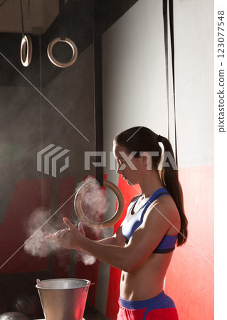 Gym Chalk Magnesium Carbonate hands clap woman 123077548