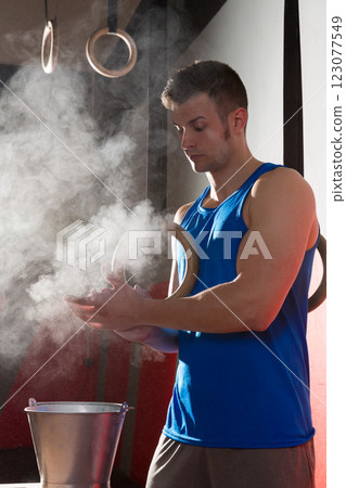 Gym Chalk Magnesium Carbonate hands clap man Gym Chalk Magnesium Carbonate hands clap man 123077549