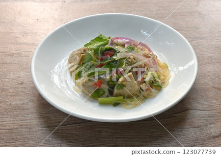 glass noodles with Vietnamese sausage and chop pork spicy salad on plate glass noodles with Vietnamese sausage and chop pork spicy salad on plate 123077739