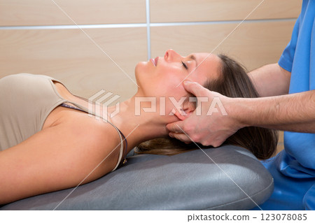 facial reflexology doctor hands in woman face facial reflexology doctor hands in woman face 123078085