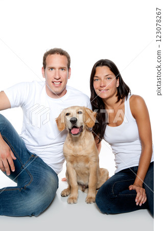 couple in love puppy dog golden retriever 123078267
