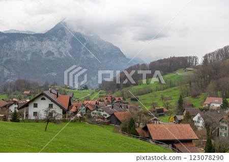 Winding mountain road in Canton of St. Gallen, Glarus Alps region, Switzerland, Europe. Winding mountain road in Canton of St. Gallen, Glarus Alps region, Switzerland, Europe. 123078290