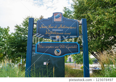 Sainte-Anne-de-Bellevue, Quebec, Canada - August 27 2021 : Sign of the partner city Sainte-Anne-de-Bellevue and Wolfville. 123078497
