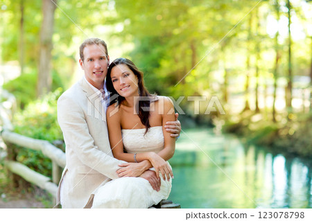 couple of lovers in love in park river hug couple of lovers in love in park river hug 123078798