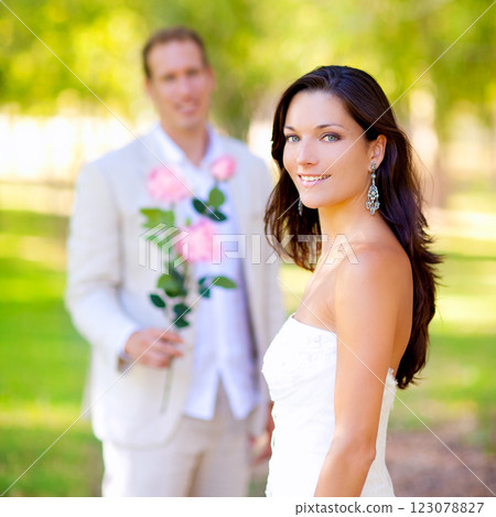 couple just married with man holding flowers couple just married with man holding flowers 123078827