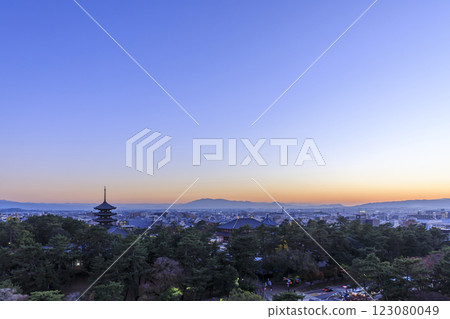 Evening view of Nara: Kofuku-ji Temple's five-story pagoda and the cityscape (Nara City, Nara Prefecture) Evening view of Nara: Kofuku-ji Temple's five-story pagoda and the cityscape (Nara City, Nara Prefecture) 123080049