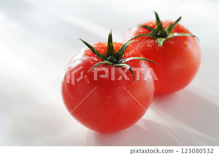 Tomato with water drops (white background) 123080532