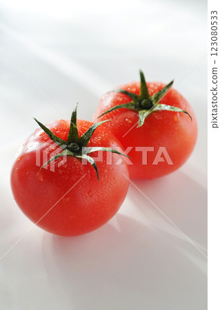 Tomato with water drops (white background) 123080533