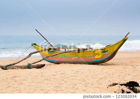 Colorful boat moored near the Ocean 123082034