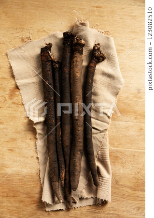 Dietary medicinal earth vegetable scorzonera on a napkin Dietary medicinal earth vegetable scorzonera on a napkin 123082510