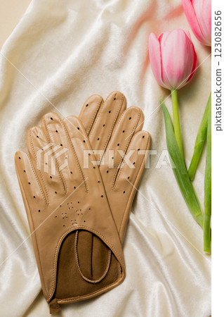 Beige leather gloves with pink tulips Beige leather gloves with pink tulips 123082656