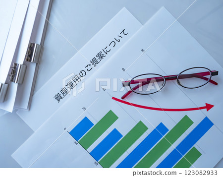 Graphs, glasses and documents on the table Graphs, glasses and documents on the table 123082933