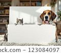 Beagle dog and kittens holding blank white sign at home 123084097