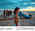 Model posing in the desert with a futuristic racing car drifting 123084098