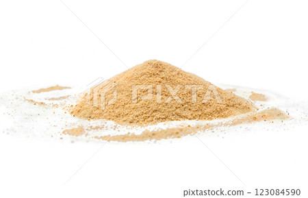 There is a sizable pile of fine sand resting on a clean isolated background 123084590