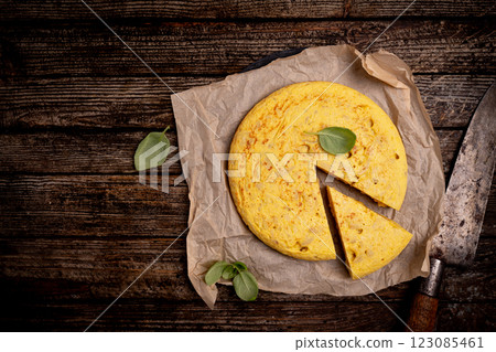 Spanish omelette with potatoes and onion 123085461