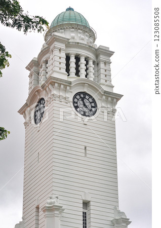 Oldest Victoria Theatre and Concert Hall in Empress Place, Singapore, with a complex of two buildings and a clock tower. Oldest Victoria Theatre and Concert Hall in Empress Place, Singapore, with a complex of two buildings and a clock tower. 123085508