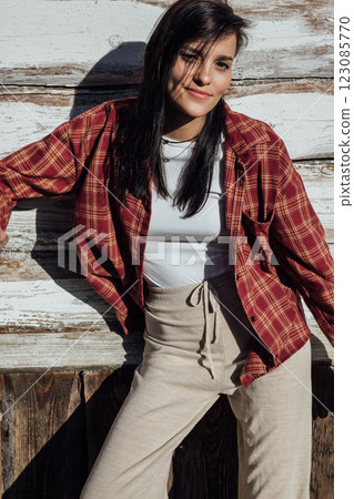 Beautiful Fashionable Slim Brunette Woman In Rural Area Beautiful Fashionable Slim Brunette Woman In Rural Area 123085770