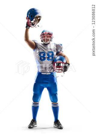 Football player. American football player holding two helmets. Human emotions and facial expressions concept. Isolated in white. Sports victory 123086812