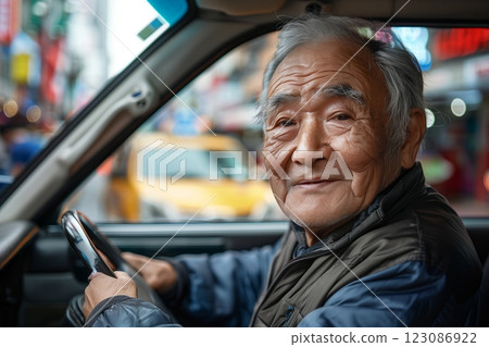 A smiling elderly man sitting in a car, showcasing warmth and community spirit. A smiling elderly man sitting in a car, showcasing warmth and community spirit. 123086922