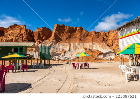 Famous barracas, bars and restaurants at Canoa Quebrada Beach, Brazil 123087621
