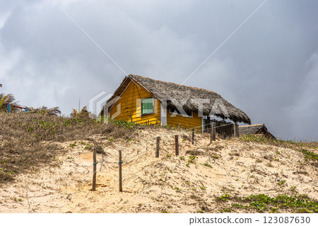Famous barracas, bars and restaurants at Canoa Quebrada Beach, Brazil 123087630