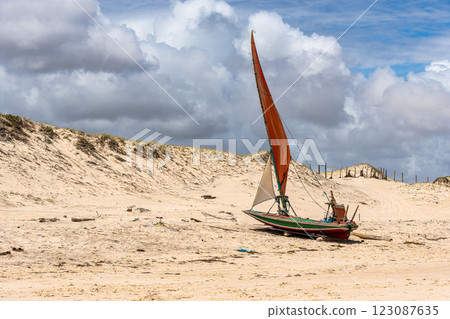 Fisherboats at Canoa Quebrada Beach at Aracati in Ceara, Brazil. Bay Coastline Fisherboats at Canoa Quebrada Beach at Aracati in Ceara, Brazil. Bay Coastline 123087635
