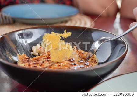 Close up view of beautifully plated milk rice dessert in restaurant 123089399