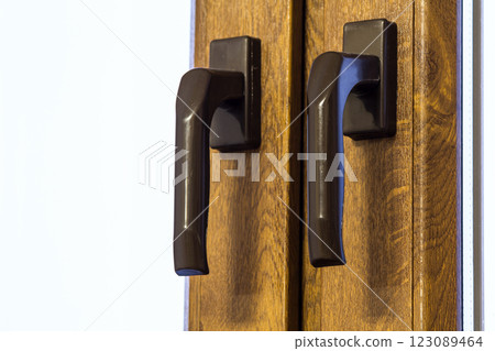 Wooden modern window handle. Home interior detail. 123089464