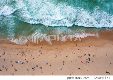 Overhead drone shot of unrecognizable tourists and Overhead drone shot of unrecognizable tourists and 123091135