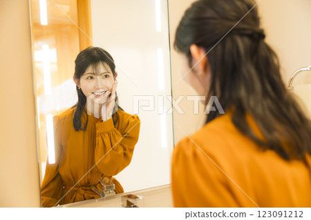 Woman getting dressed in the washroom 123091212