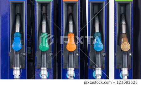 Fuel gasoline dispenser in gasoline station, Petrol pump filling nozzle at gasoline station fuel gasoline dispenser, Pistol pump gun fuel nozzle. 123092523