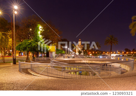 Torre del Oro and Riverside Walk at Night, Seville, Spain Torre del Oro and Riverside Walk at Night, Seville, Spain 123093321