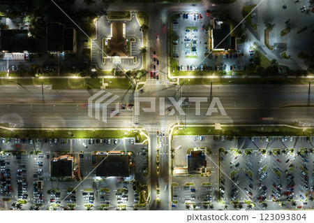 Traffic rush at shopping malls and small businesses in evening time in North Port, Florida. USA transportation and retail infrastructure concept Traffic rush at shopping malls and small businesses in evening time in North Port, Florida. USA transportation and retail infrastructure concept 123093804
