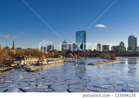 Boston city skyline with high-rise buildings seen from  Longfellow bridge over Charles river during winter sunset 123094178