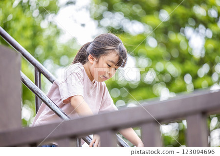 Girls playing in the park 123094696