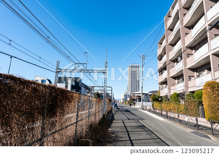 Looking towards Kokuryo Station along the Keio Line, a clear, blue winter sky, Kokuryo-cho, Chofu City, Tokyo 123095217