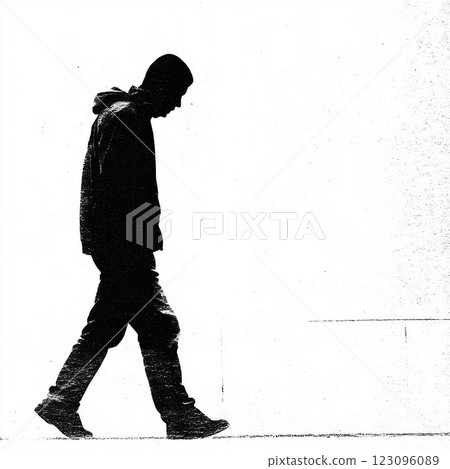 Person walking alone against a blank background in silhouette 123096089