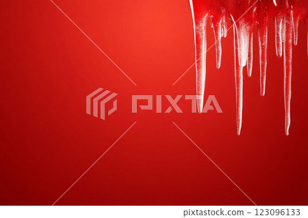 Red background with dripping ice formation during winter season 123096133