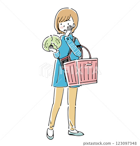 A housewife holding a shopping basket and examining cabbages 123097348
