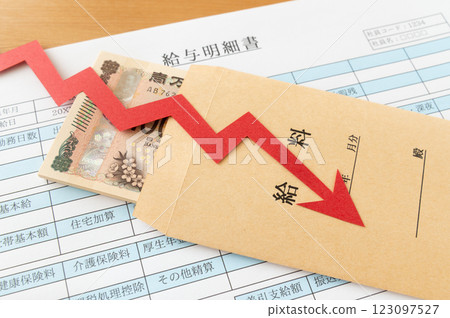 Pay slip, pay envelope and down arrow Salary 123097527