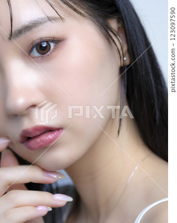 Woman applying makeup, foundation, brush and compact Woman applying makeup, foundation, brush and compact 123097590
